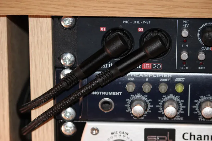 RUXELY right-angled 6.35mm TRS instrument cables plugged into the front instrument inputs of a Focusrite 18i20 preamp